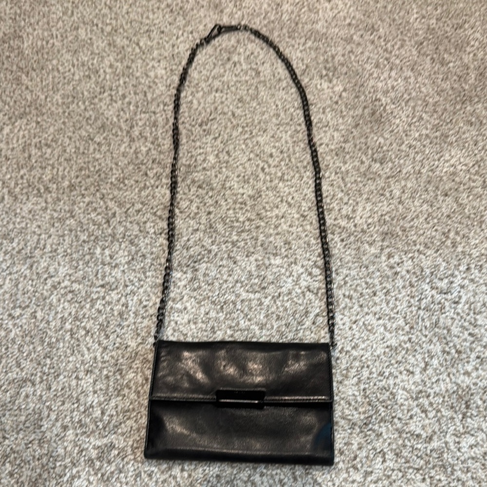 Elegant Black Prada Leather Wallet with chain 6”x4.25”